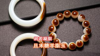且末糖白玉是和田玉中的一种优质品种,‌以其细腻的质地,‌纯白的